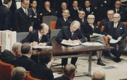 Jack Lynch (seated on right) with Patrick Hillery as he signs the accession treaty to join the EEC in Brussels on January 22, 1972