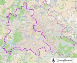 Берлинская стена (сплошной фиолетовой линией) на карте города. Былыми точками отмечены КПП.