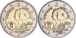 UNC (чеканка Королевского монетного двора Нидерландов, слева) и BU (чеканка Парижского монетного двора, справа) версии монеты