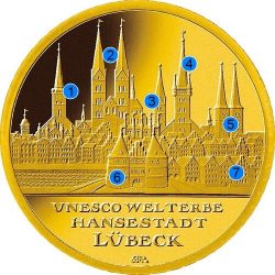 Памятники архитектуры на монете: 1) Церковь Святой Марии; 2) Любекский собор; 3) Церковь Св. Петра; 4) Церковь Св. Якова; 5) Церковь Св. Эгидия; 6) Городские дома; 7) Голштинские ворота.